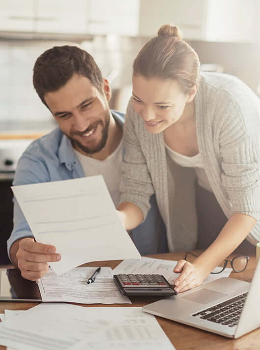 couple looking over bills together